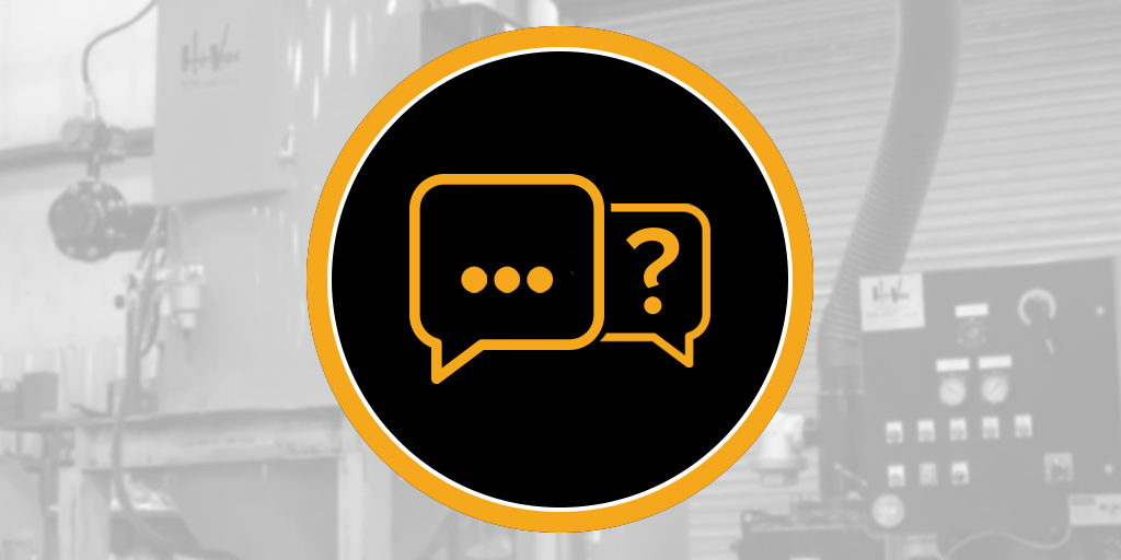 Black circular badge with orange speech-bubble icons over blurred Hi-Vac industrial vacuum equipment and control panel.
