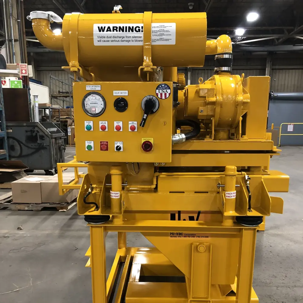 Yellow Hi‑Vac industrial vacuum unit with control panel, gauges, emergency stop and Made in USA badge
