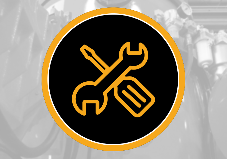Black round icon with orange wrench and screwdriver over grayscale industrial vacuum pump and motor — Hi-Vac maintenance