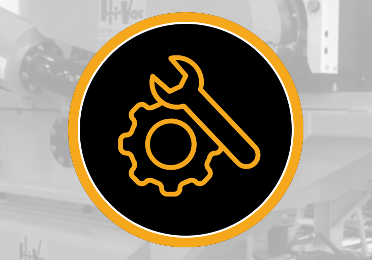 Orange wrench-and-gear icon in a black circle overlaid on a grayscale Hi‑Vac industrial vacuum equipment shop