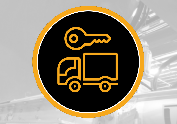 Black circular badge with yellow key above a box-truck icon, over a grayscale industrial shop, suggesting vacuum truck use